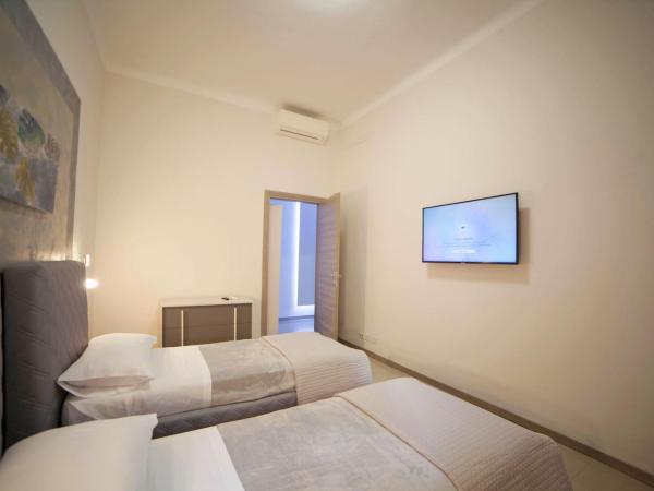 IMHOME - Cadorna House : photo 3 de la chambre chambre lits jumeaux