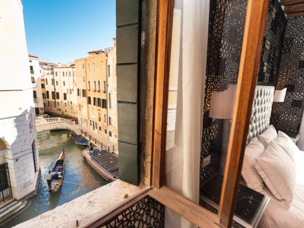 Domus Superior : photo 2 de la chambre chambre double supérieure - vue sur canal