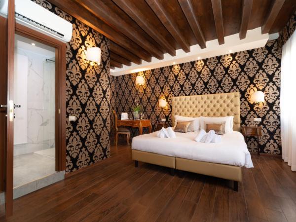 Domus Superior : photo 3 de la chambre chambre double supérieure - vue sur canal