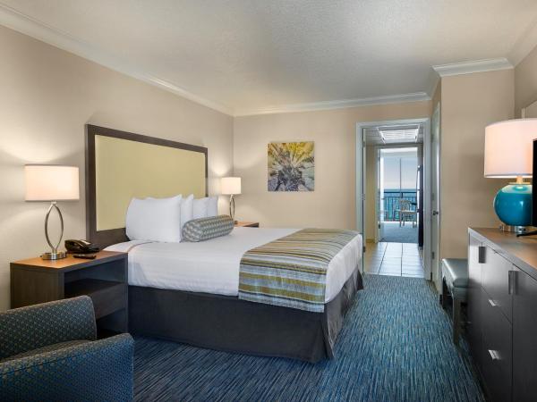 Coral Beach Resort : photo 1 de la chambre suite côté océan - 1 lit king-size et 1 lit double escamotable