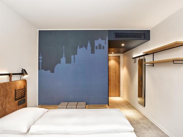 H2 Hotel München Olympiapark : photo 3 de la chambre chambre double ou lits jumeaux