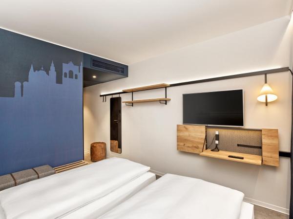 H2 Hotel München Olympiapark : photo 4 de la chambre chambre double ou lits jumeaux