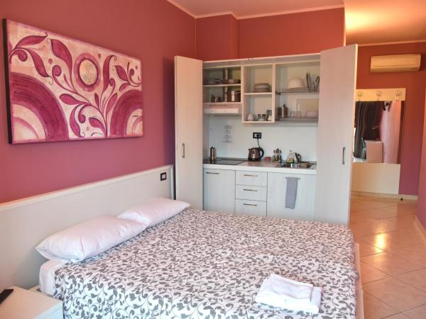 Agriturismo Argaland : photo 2 de la chambre chambre double ou lits jumeaux - vue sur jardin