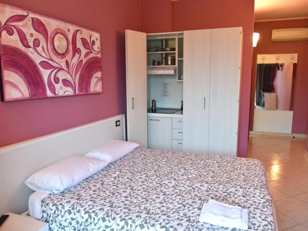 Agriturismo Argaland : photo 4 de la chambre chambre double ou lits jumeaux - vue sur jardin