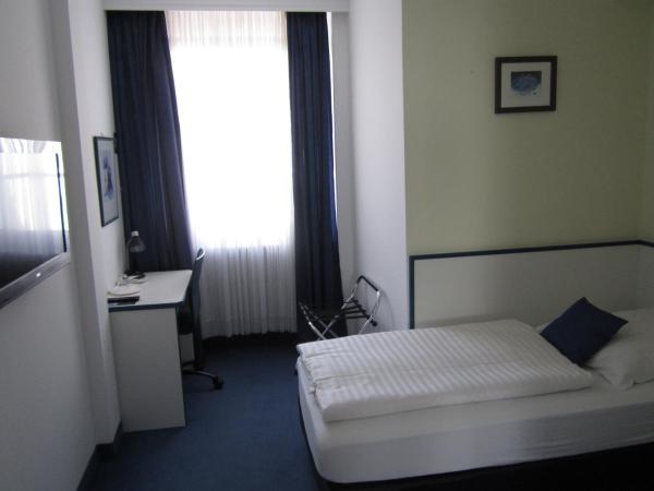 Hotel City Kräme am Römer - Self Check In : photo 9 de la chambre chambre simple