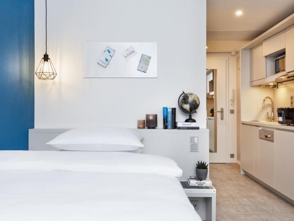 H.ome Serviced Apartments München : photo 8 de la chambre appartement supérieur