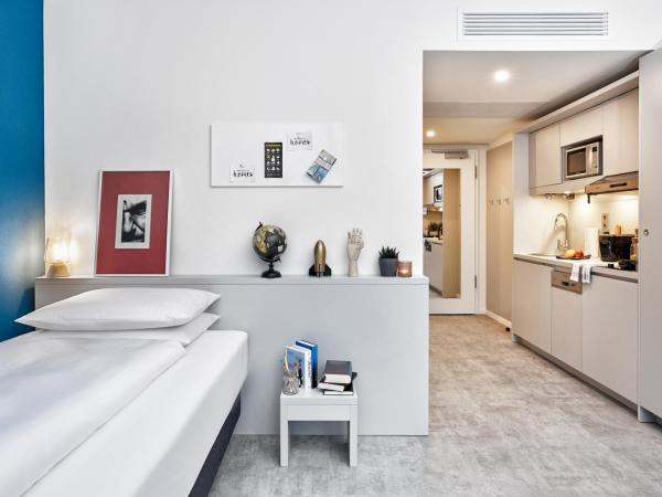 H.ome Serviced Apartments München : photo 8 de la chambre studio