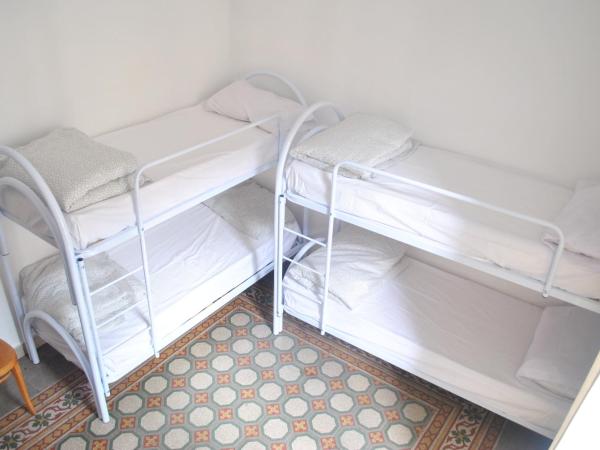 Sunrise Hostel & Rooms : photo 2 de la chambre lit simple dans dortoir pour femmes