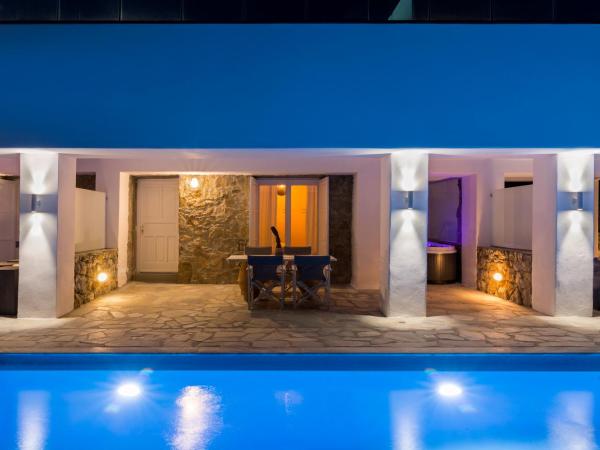 Amperian Mykonos Suites & Villas : photo 4 de la chambre appartement 2 chambres avec bain à remous - vue sur mer