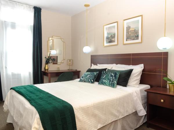 Maison Cartier Montreal : photo 4 de la chambre chambre lit queen-size avec baignoire spa