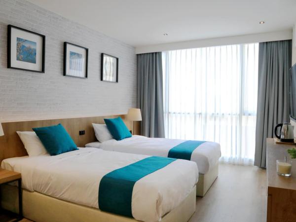 B Stay Hotel - SHA Plus Certified : photo 9 de la chambre chambre lits jumeaux deluxe