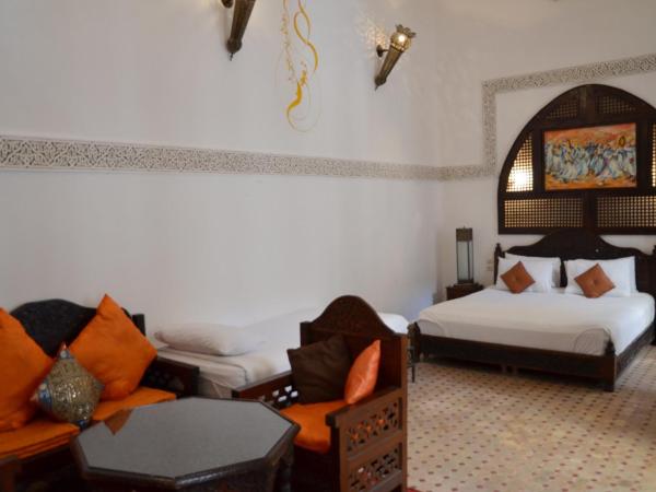 Riad Jamaï : photo 1 de la chambre suite junior safran (2 adultes + 2 enfants)