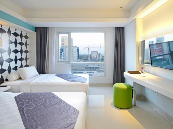 CROWN PRINCE Hotel Surabaya Managed by Midtown Indonesia : photo 4 de la chambre chambre lits jumeaux cozy