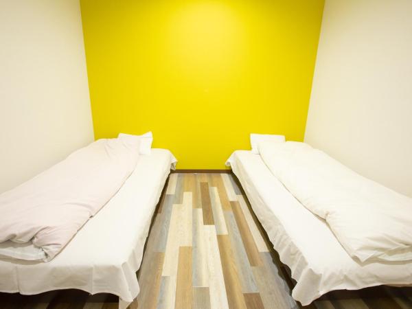 123 Guesthouse : photo 2 de la chambre twin room with shared bathroom - f