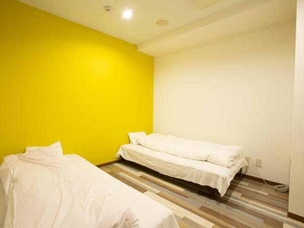 123 Guesthouse : photo 4 de la chambre twin room with shared bathroom - f