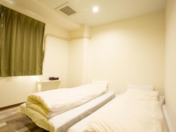 123 Guesthouse : photo 2 de la chambre twin room with shared bathroom - i