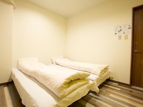 123 Guesthouse : photo 4 de la chambre twin room with shared bathroom - i