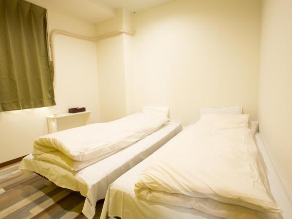 123 Guesthouse : photo 5 de la chambre twin room with shared bathroom - i