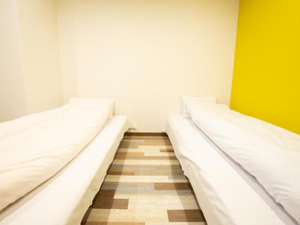 123 Guesthouse : photo 2 de la chambre chambre triple - vue sur ville