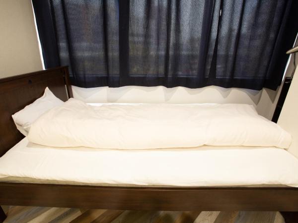 123 Guesthouse : photo 3 de la chambre chambre triple - vue sur ville