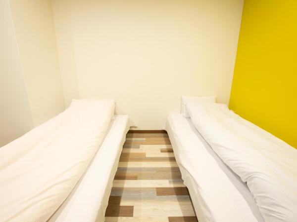 123 Guesthouse : photo 4 de la chambre chambre triple - vue sur ville