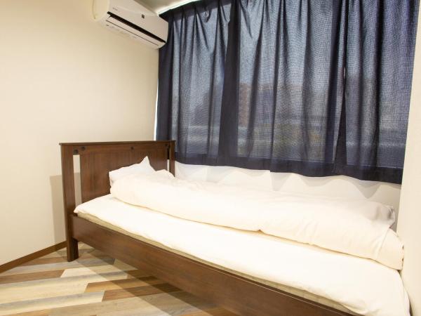 123 Guesthouse : photo 5 de la chambre chambre triple - vue sur ville