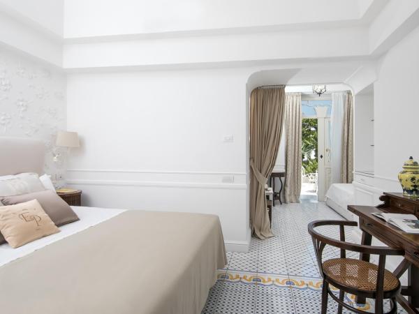 Luxury Villa Excelsior Parco : photo 4 de la chambre chambre double ou lits jumeaux deluxe – vue sur jardin
