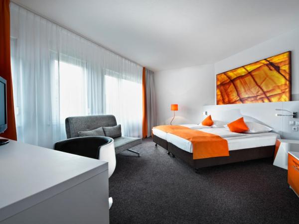 Wyndham Garden Duesseldorf City Centre Koenigsallee : photo 1 de la chambre chambre double ou lits jumeaux confort 
