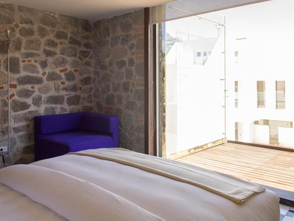 La Purificadora, Puebla, a Member of Design Hotels : photo 5 de la chambre suite d'angle avec balcon