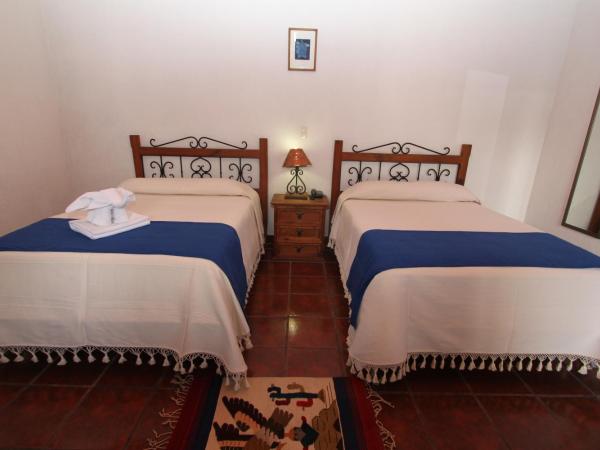 Parador Monte Carmelo : photo 5 de la chambre chambre double avec 2 lits doubles