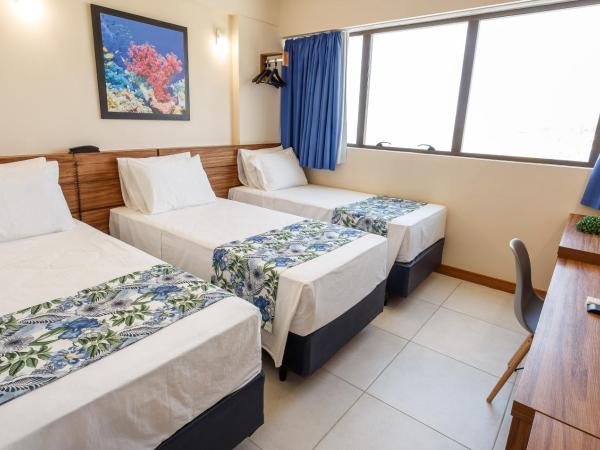Rede Andrade Riviera Premium : photo 2 de la chambre chambre triple avec 3 lits simples