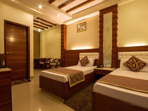 Hotel Aster Inn New Delhi : photo 10 de la chambre chambre deluxe