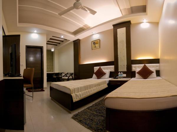 Hotel Aster Inn New Delhi : photo 9 de la chambre chambre deluxe
