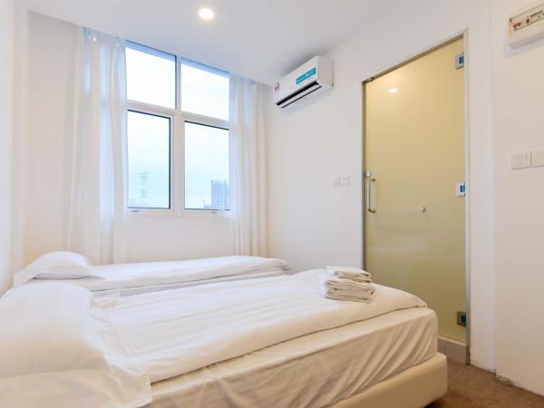 Fumah Hotel Jalan Kuching : photo 1 de la chambre chambre lits jumeaux standard