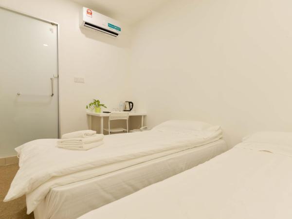 Fumah Hotel Jalan Kuching : photo 4 de la chambre chambre lits jumeaux standard