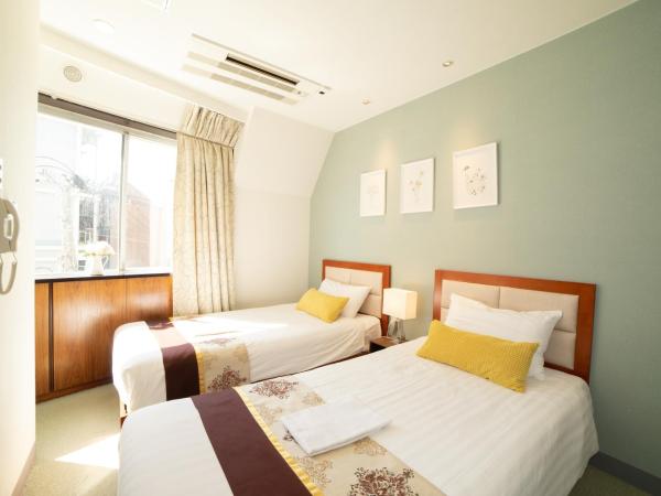 Tabata Oji Hotel : photo 3 de la chambre chambre lits jumeaux - fumeurs