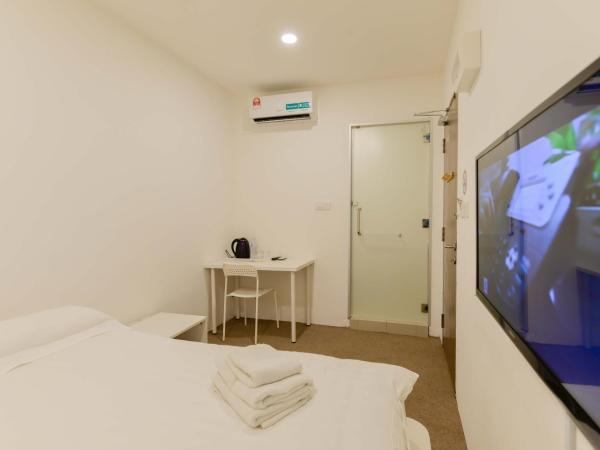 Fumah Hotel Jalan Kuching : photo 1 de la chambre chambre supérieure lit queen-size