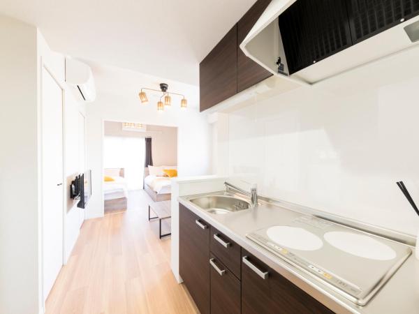 SG Residence Inn Hakataekiminami : photo 1 de la chambre one-bedroom apartment - no cleaning for consecutive night stays