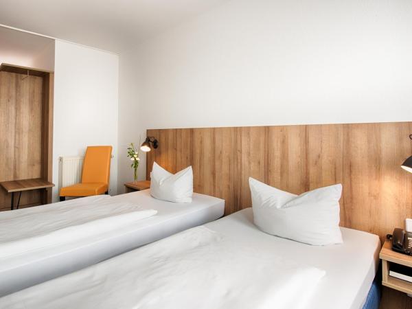 ACHAT Hotel Dresden Altstadt : photo 1 de la chambre chambre affaires lits jumeaux