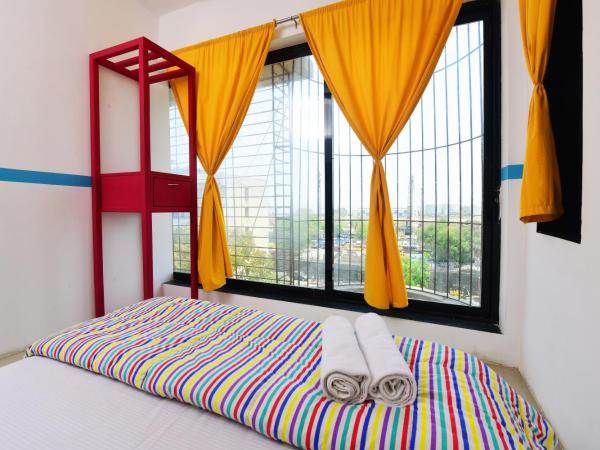 goSTOPS Mumbai : photo 3 de la chambre deluxe double ac room with shared bathroom