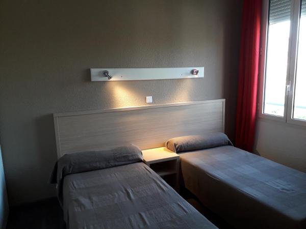 Hotel Le Terminus : photo 1 de la chambre chambre lits jumeaux standard