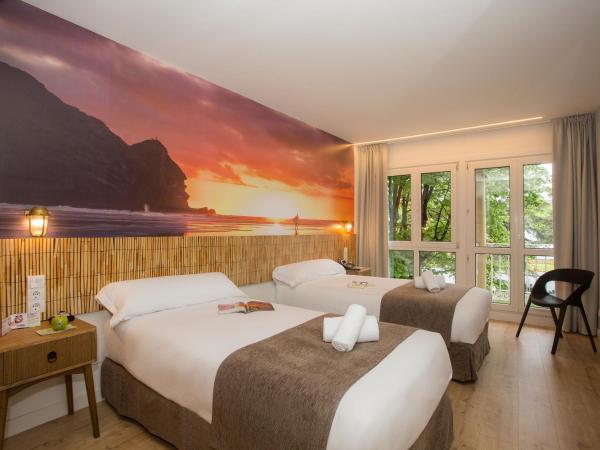 Casual de las Olas San Sebastián : photo 4 de la chambre chambre lits jumeaux