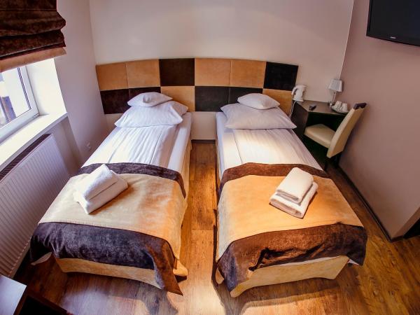 Boutique Hotel's II : photo 6 de la chambre chambre lits jumeaux