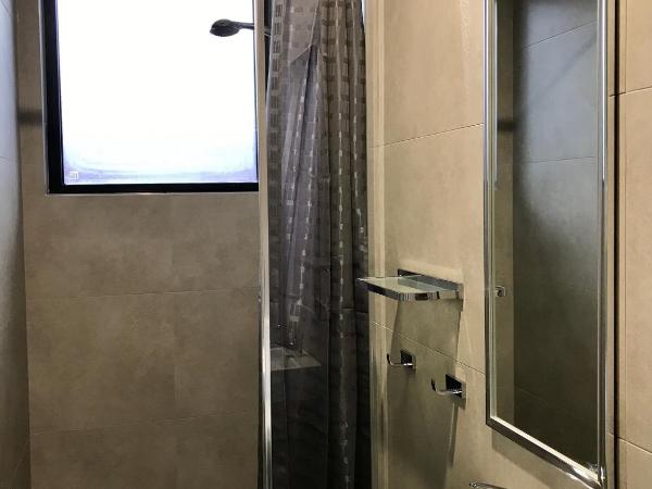 Breeze Lodge : photo 2 de la chambre lit dans dortoir mixte de 4 lits avec salle de bains commune