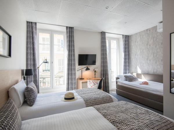 Hotel Saint Gothard : photo 1 de la chambre chambre triple standard