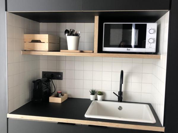 Talo Urban Rooms : photo 1 de la chambre chambre familiale supérieure