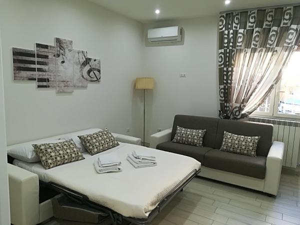 La casa di Donatella : photo 10 de la chambre chambre quadruple avec salle de bains commune