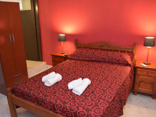 Hotel Isella : photo 6 de la chambre chambre quadruple de luxe