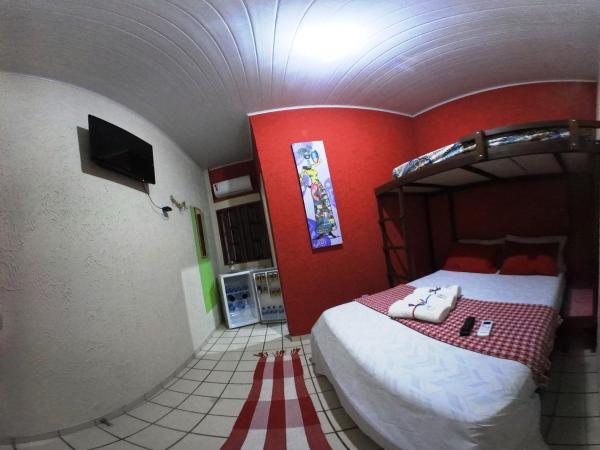 Hostel Cores do Pelô : photo 2 de la chambre triple room with air conditioned