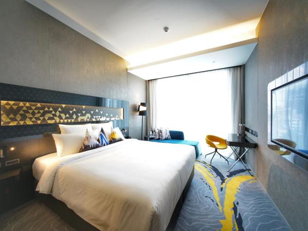 Novotel Singapore On Stevens : photo 2 de la chambre chambre double premier